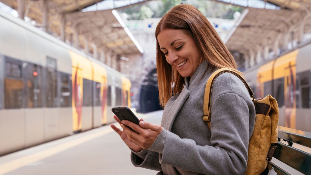 RegioJet woman in front of a train