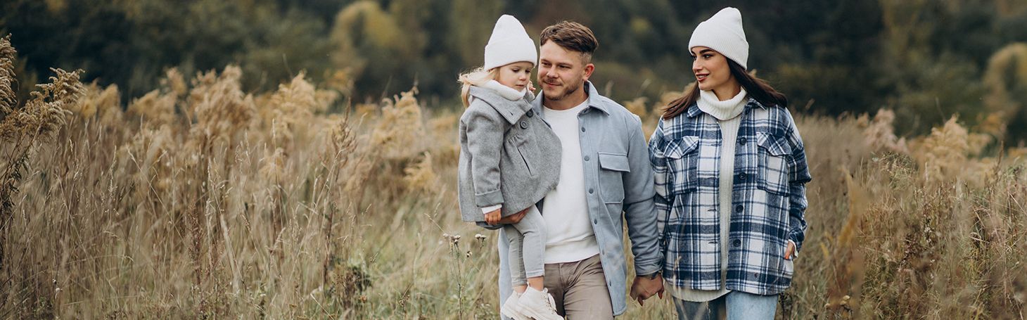 Parents with their child on a walk