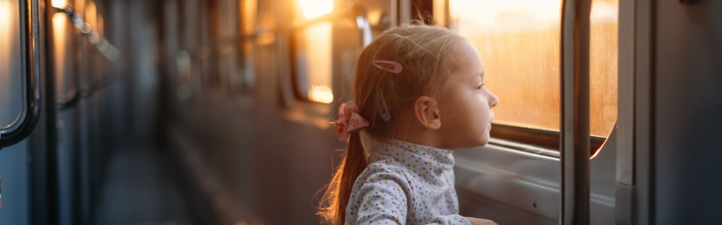 Child in a corridor on a train