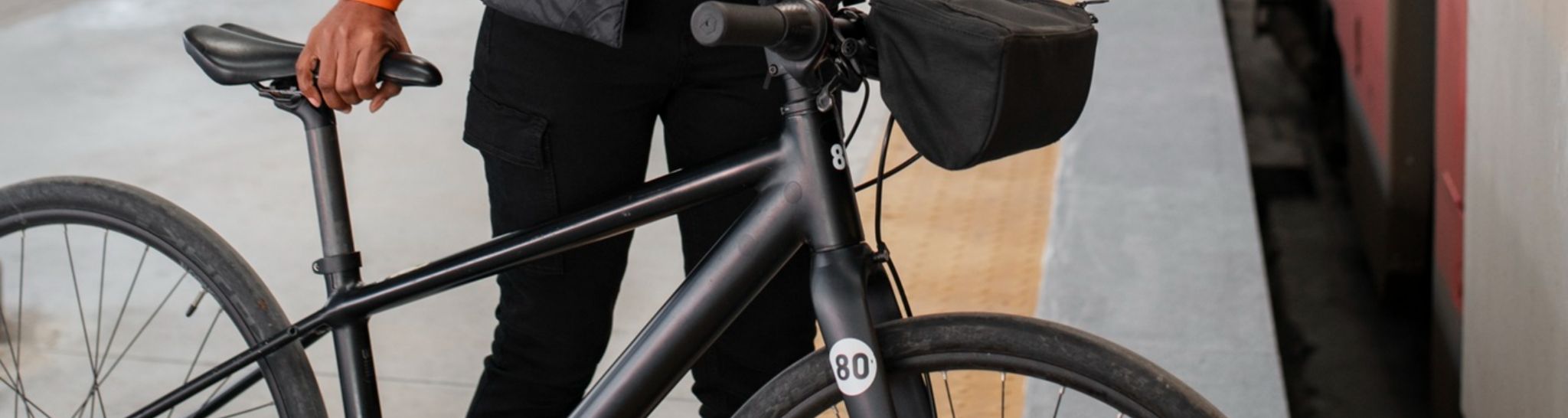 Person with a bicycle on a platform