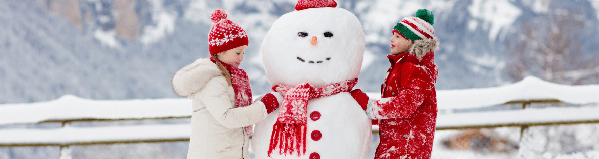 children with snowman - winter holidays kujawsko-pomorskie - when