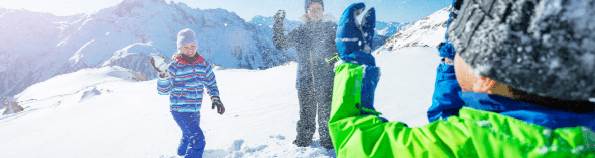 children in the mountains in winter - winter holidays in the mountains