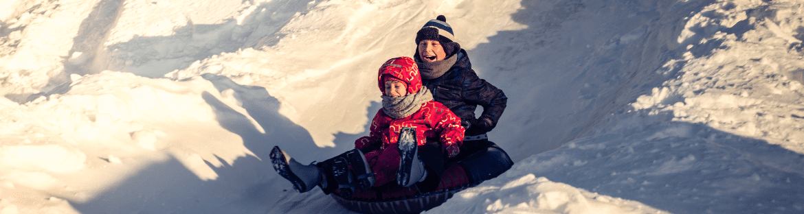 children on sledges - winter holidays dolnośląskie when