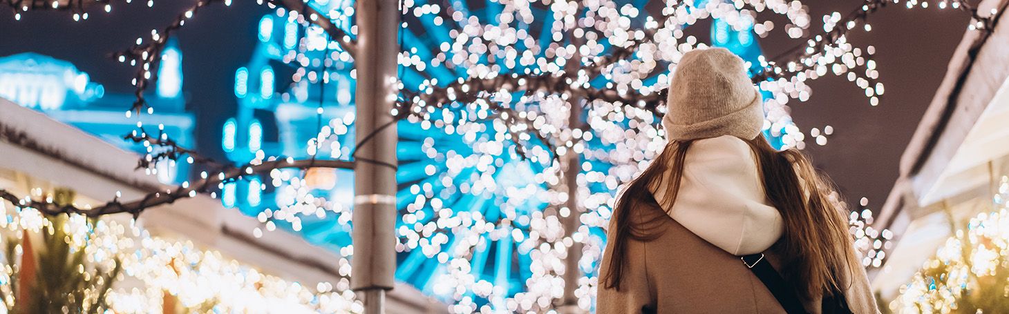 Woman looking at a glowing tree