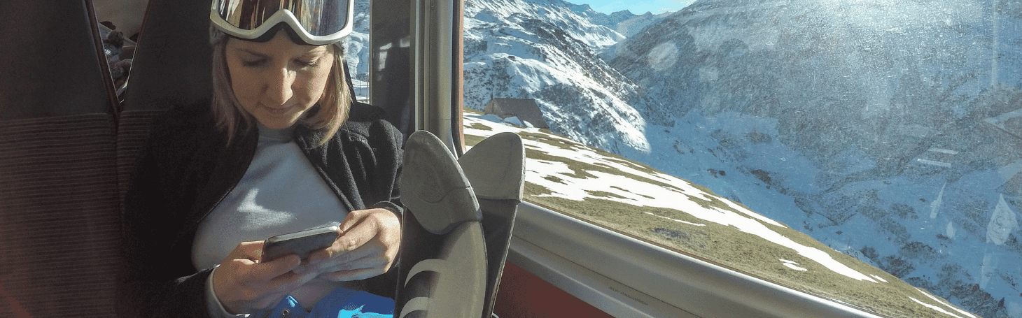 Travelski Express - everything you need to know about this carrier Woman going skiing by train