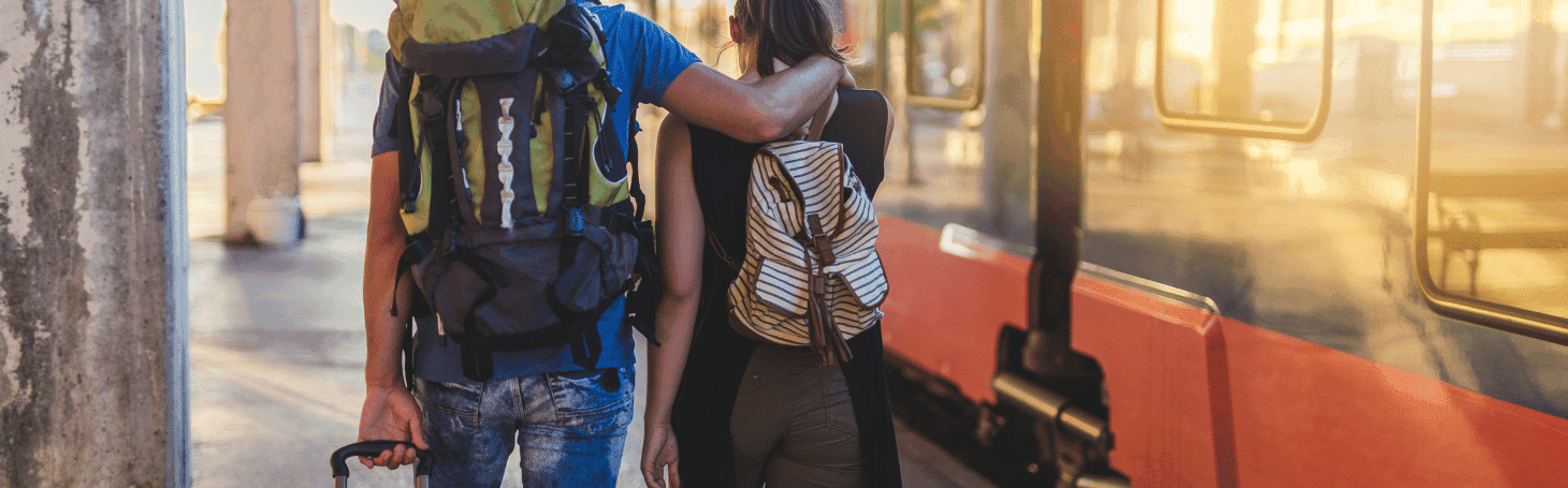 Trains to Lithuania - how and what is the best way to get there? Couple walking on the platform
