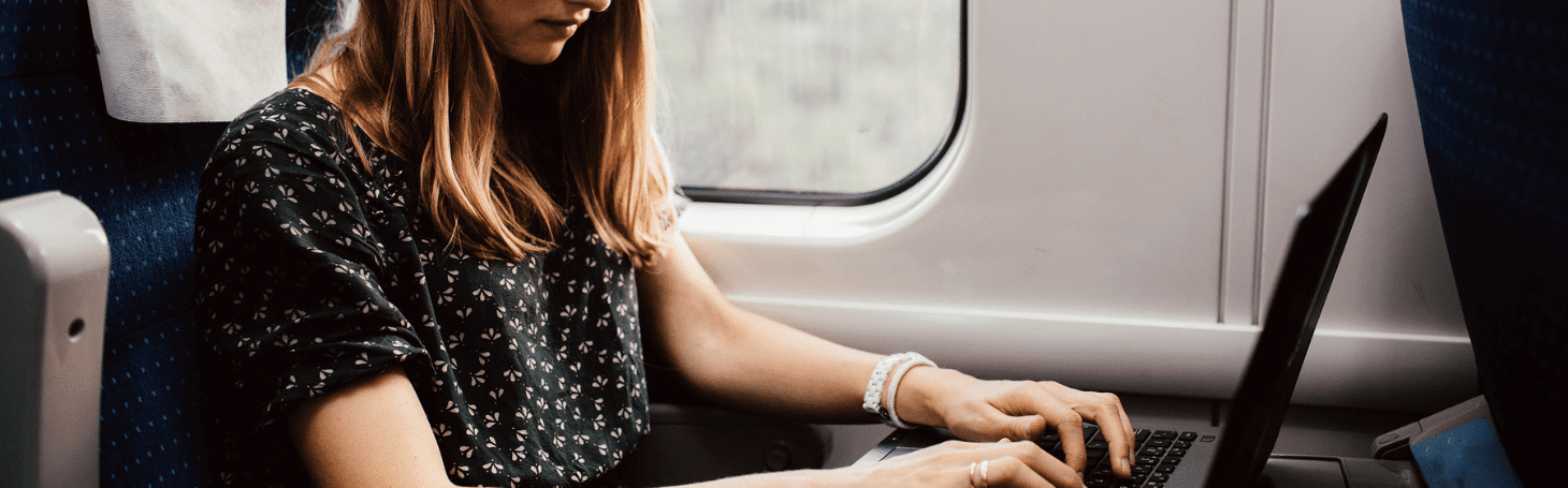 Wi-Fi on Pendolino trains Person with a laptop