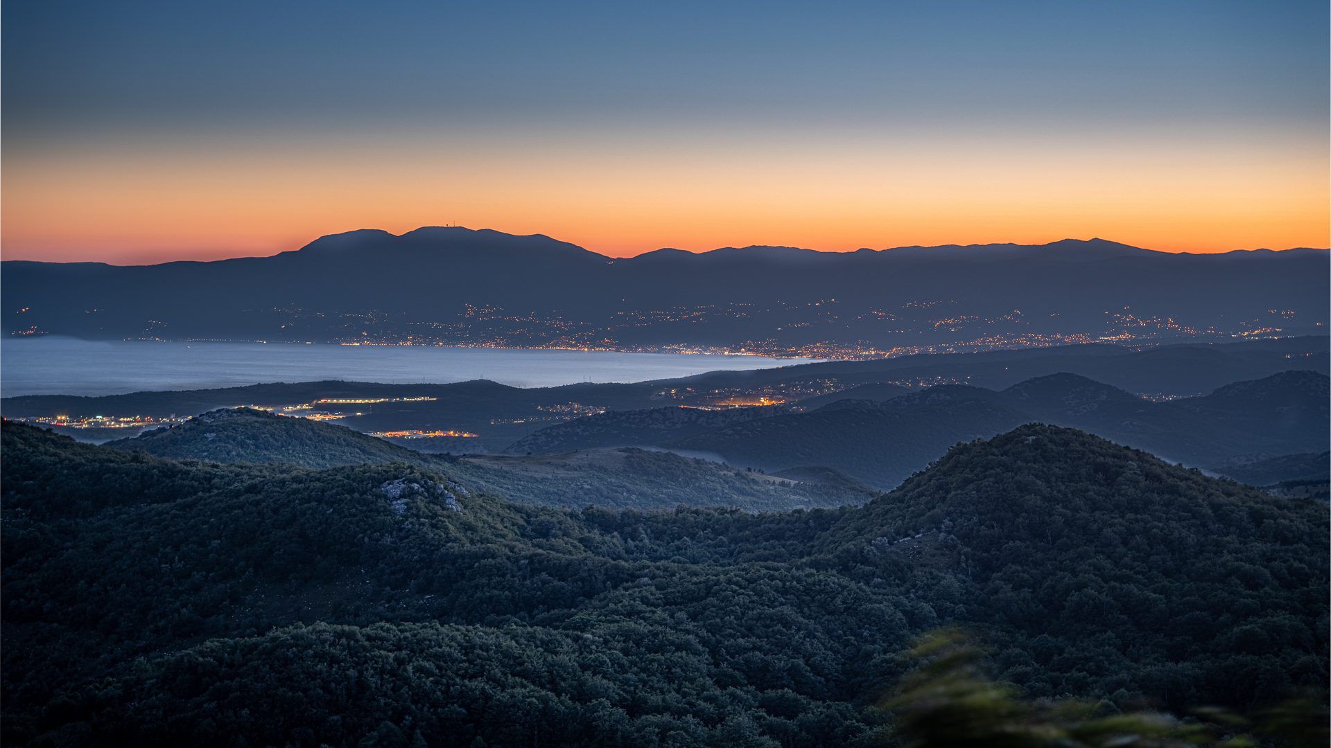 Sunrise over Opatija and Kvarner Bay Sunrise over Opatija and Kvarner Bay — the landscape you pass on the Adriatic Express to Rijeka