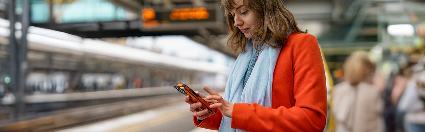 Is it possible to buy a ticket on an IC train? Woman on the platform