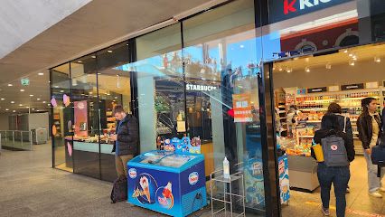k kiosk, shop near Lugano station