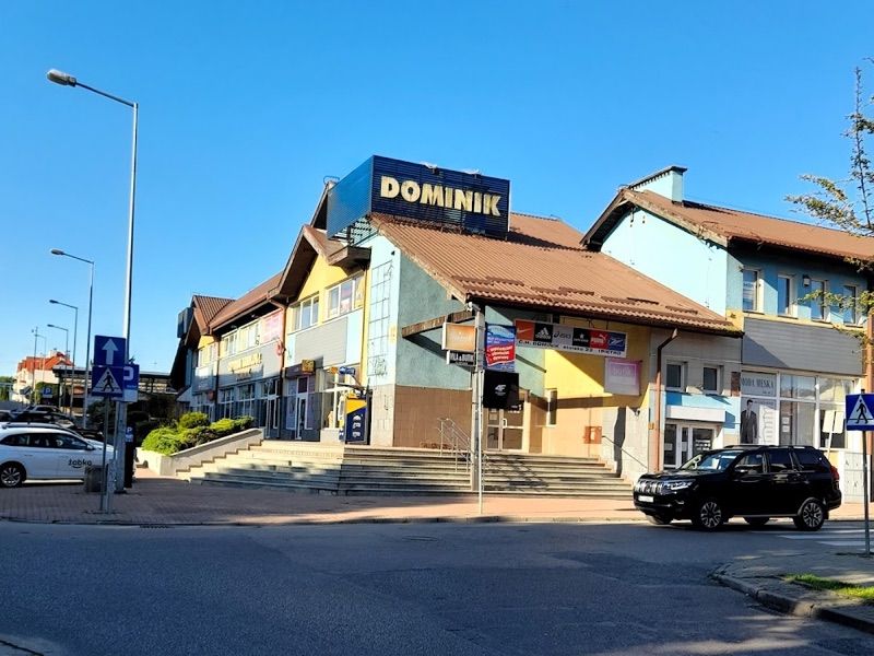 Dominik. Dom Handlowy, shopping mall near Giżycko station