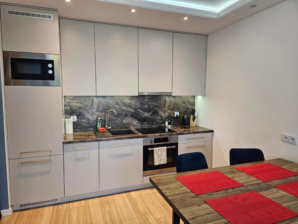 Nowoczesny i komfortowy apartament przy ulicy Kurpiowskiej blisko centrum miasta, place to stay near Siedlce station